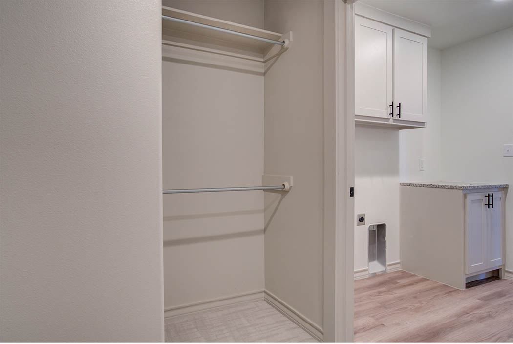 Laundry room in new Lubbock home for sale by Sharkey Custom Homes.