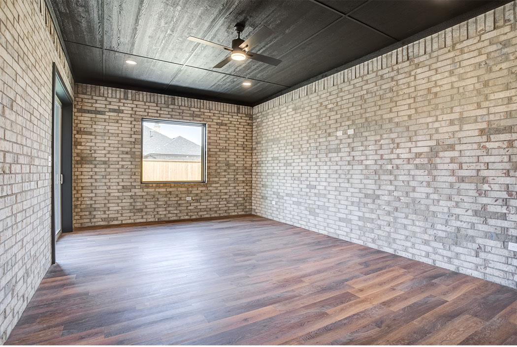Gorgeious, versatle bonus room with brick walls in new home for sale in Lubbock.