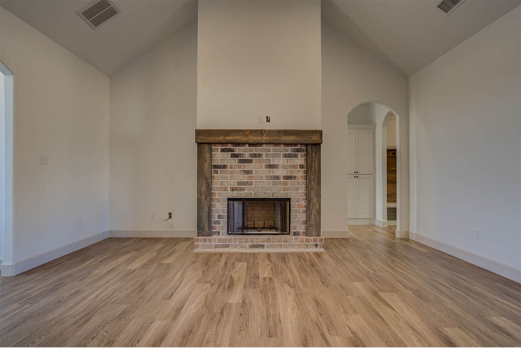 Living area fireplace in home for sale in Lubbock, Texas.