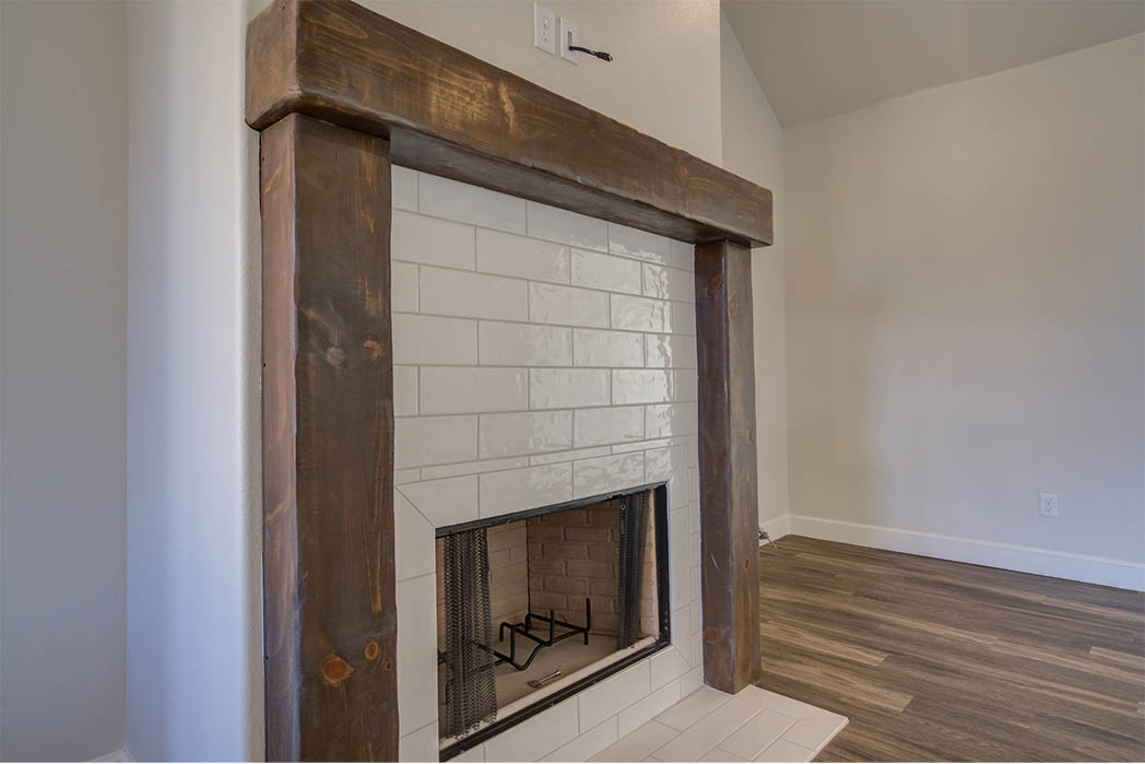 Fireplace in living room of beautiful West Texas home for sale.