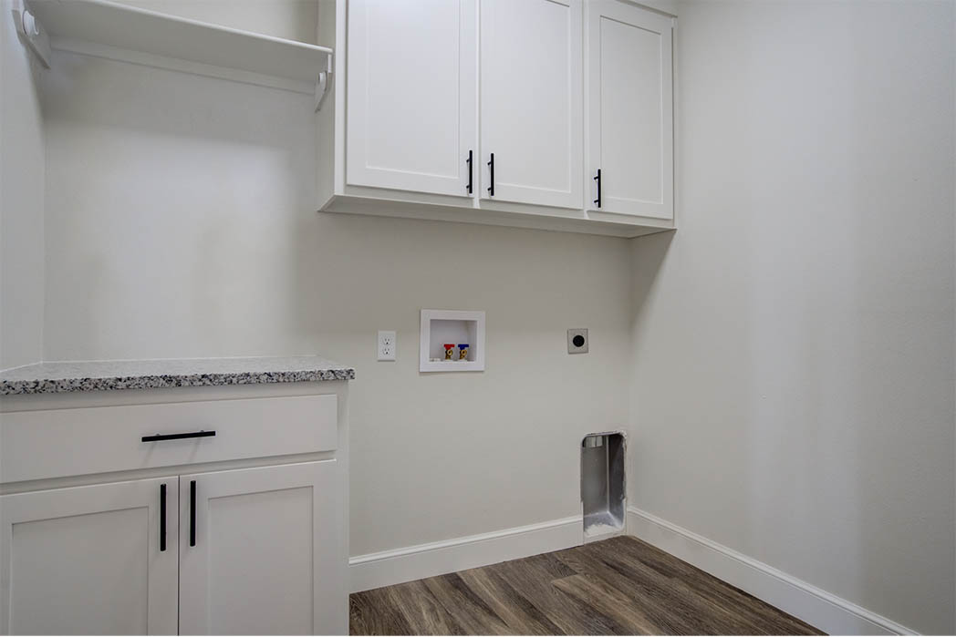 Spacious laundry room in home for sale in Lubbock.