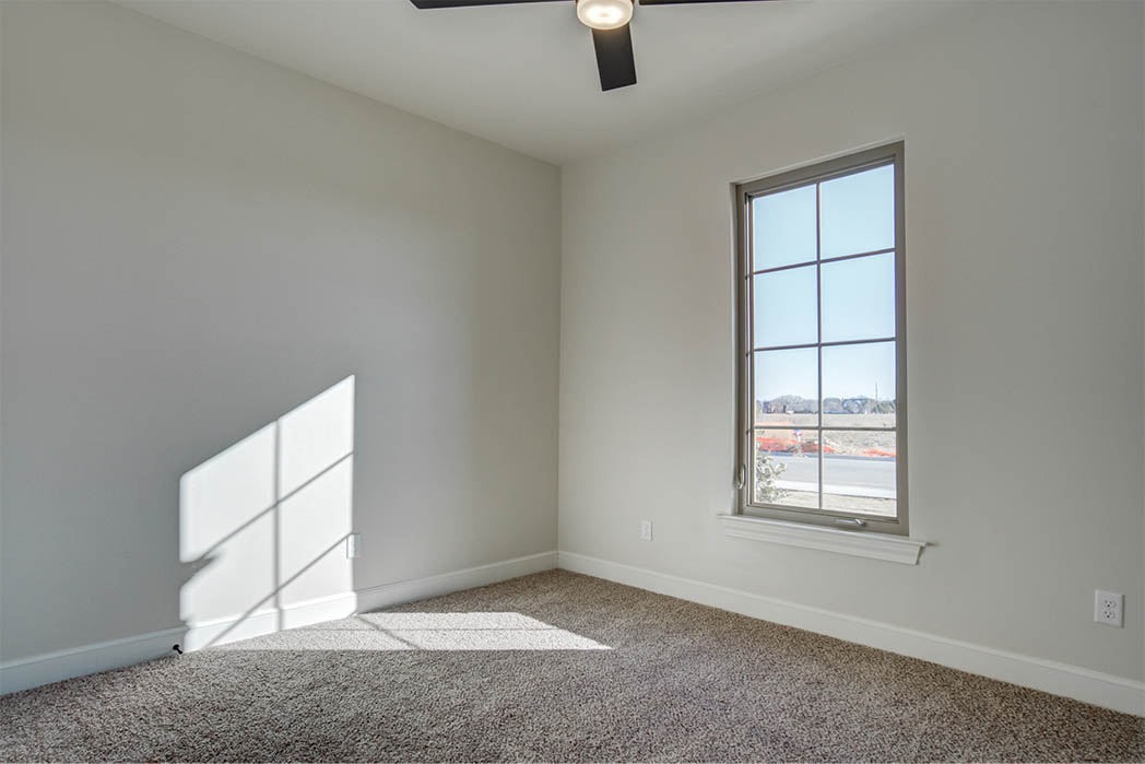 Spacious bedroom in Lubbock area home for sale.