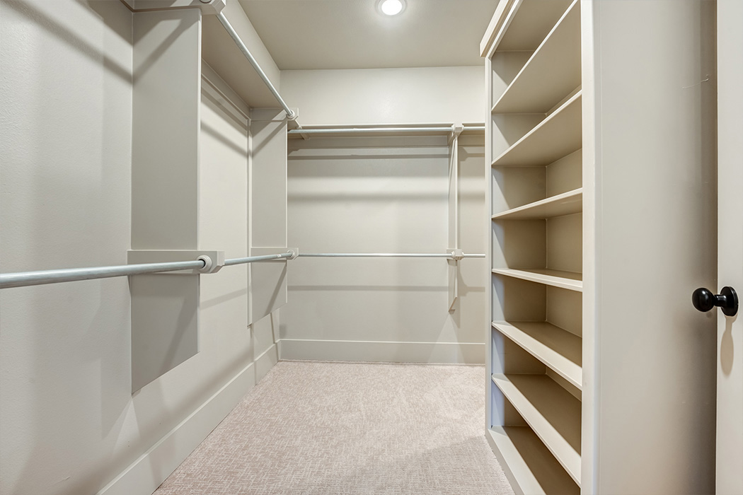 Spacious master closet with built-in shelves in new Lubbock home for sale