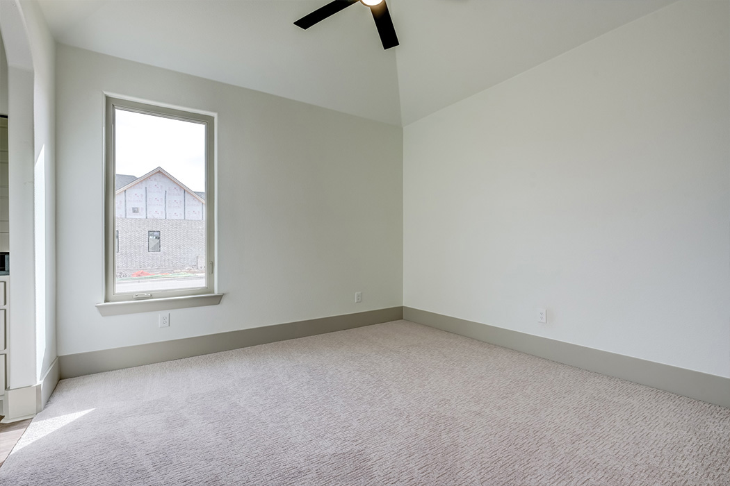 Spacious guest bedroom in amazing new home for sale in Lubbock, Texas.