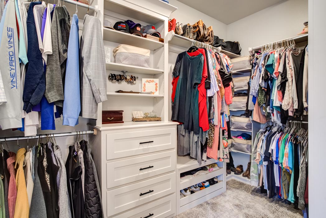 Spacious master closet with built-in drawers in new home for sale in Lubbock, Texas.