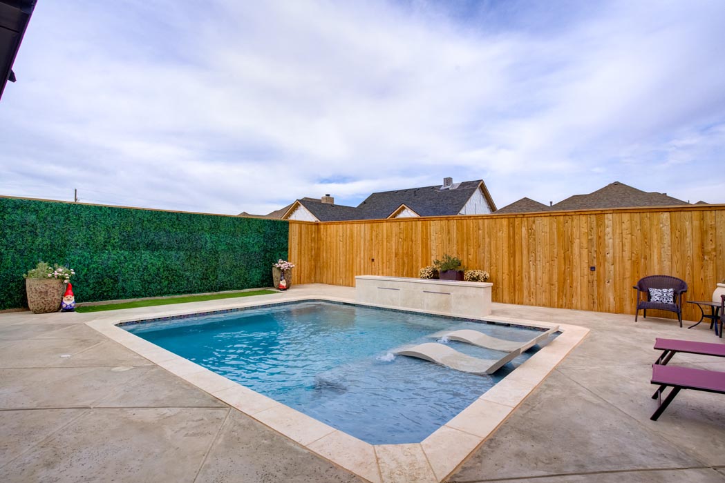 Pool in backyard of beautiful new home for sale in Lubbock.