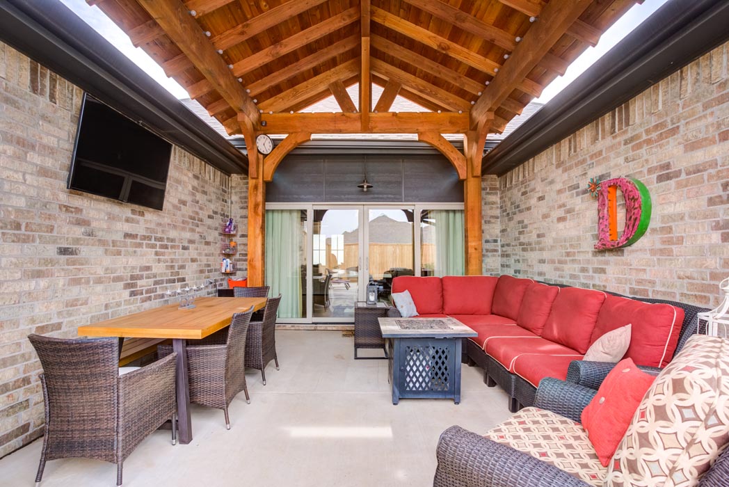 View of spacious outdoor covered pation in new home for sale in Lubbock.