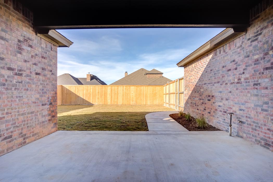 View of spacious backyard of new Lubbock, Texas home.