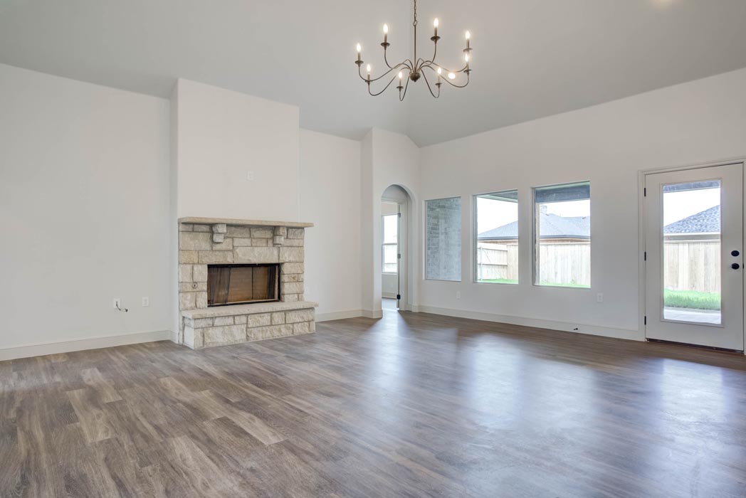 Beautiful living area with vaulted ceiling in new home for sale in Lubbock.