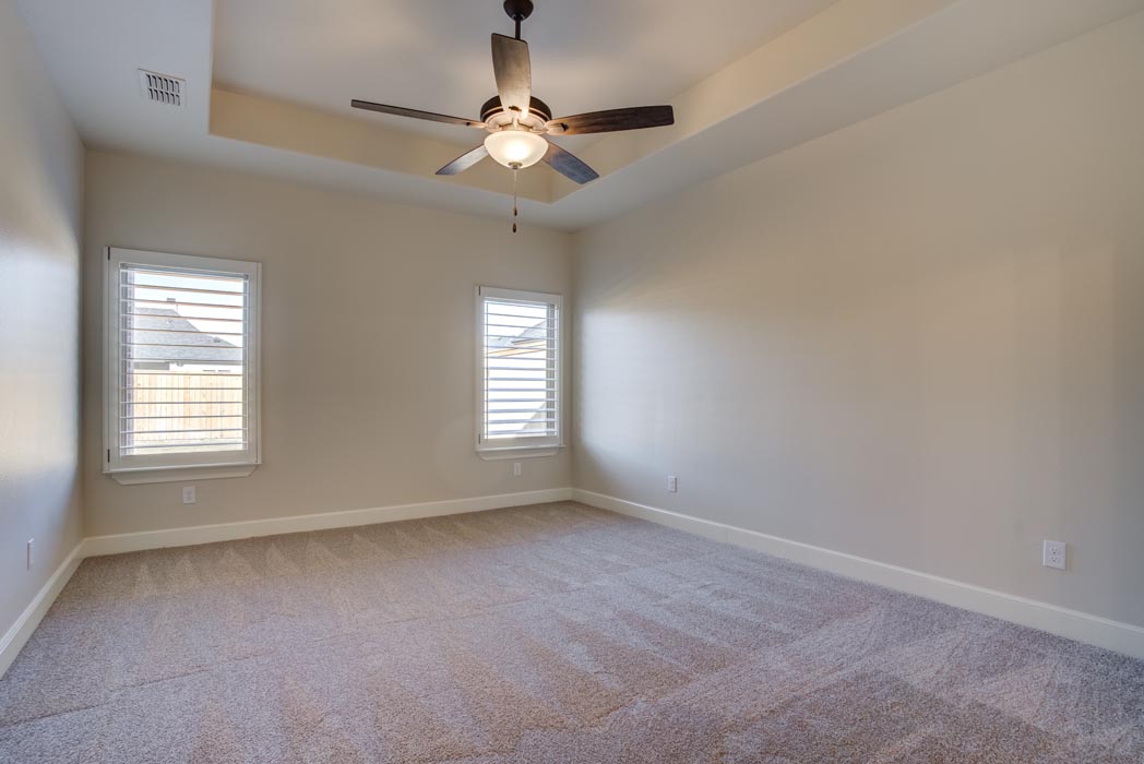 Spacious bedroom in home for sale in the Lubbock area.