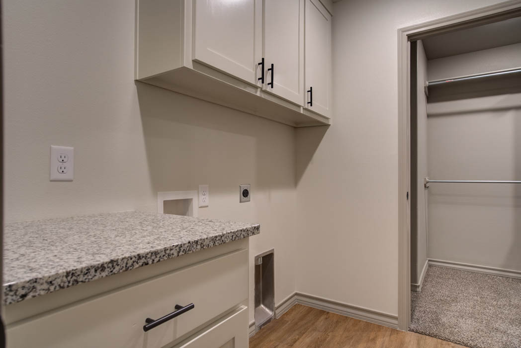 Laundry-mud room area in new home for sale in Lubbock.