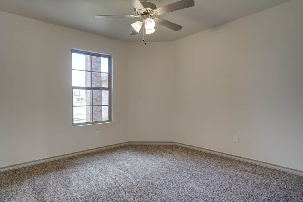 Spacious bedroom in new home for sale in Lubbock, Texas.