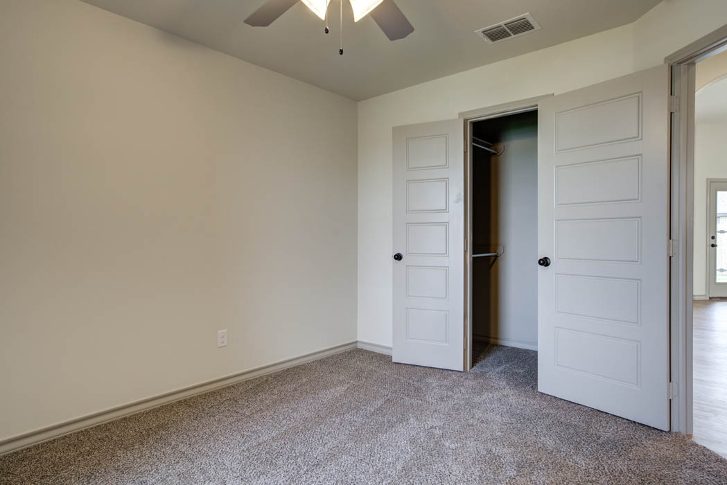 Spacious bedroom in new home for sale in Lubbock, Texas.