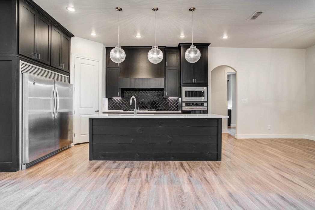Spacious kitchen with modern appliances in new home for sale in Lubbock.