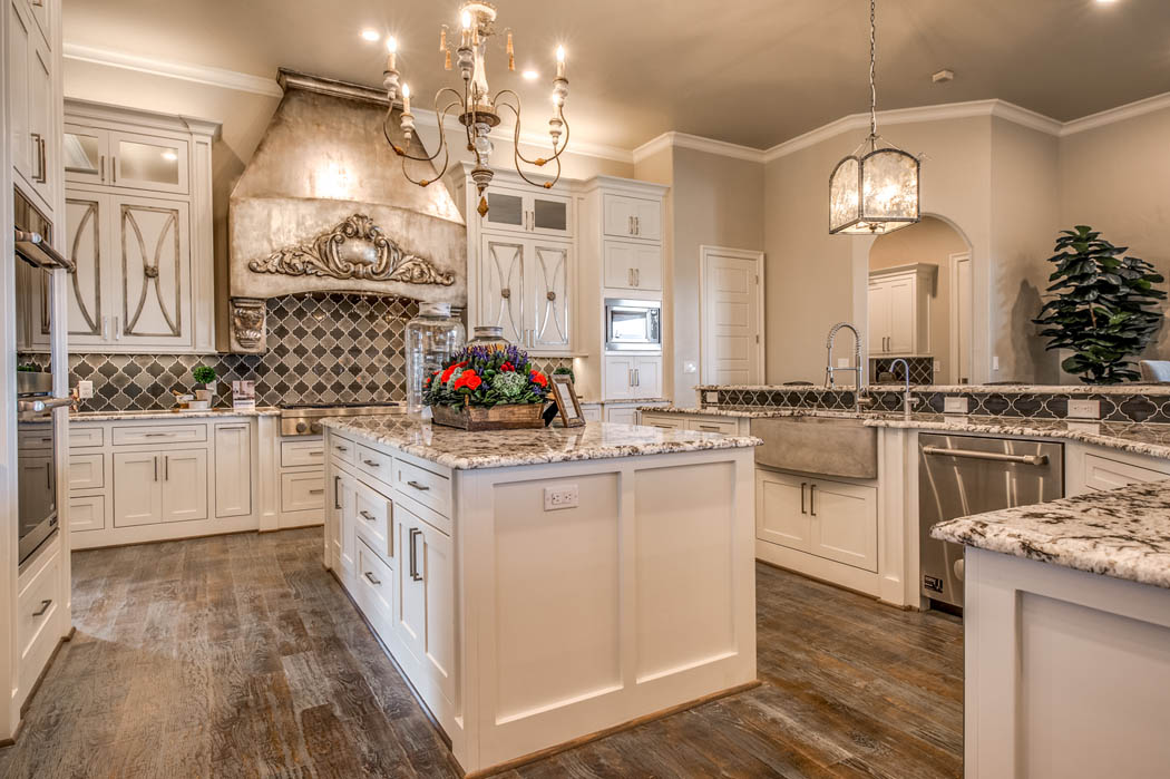 Spacious kitchen with wonderful detail in custom home in the Lubbock area.