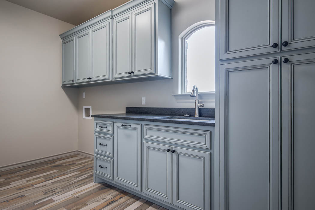 Spacious laundry room in custom home in the Lubbock area.