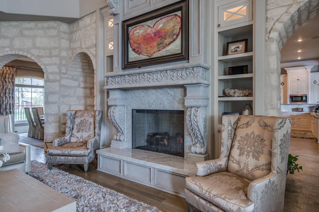 Living area of custom home, featuring fireplace.