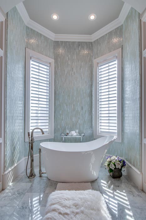 Amazing bath tub in custom home, including special ceiling treatment.