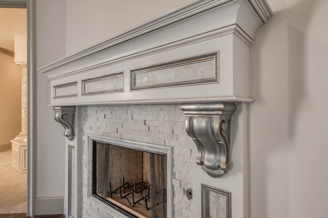 Detail of beautiful fireplace in custom Lubbock home.