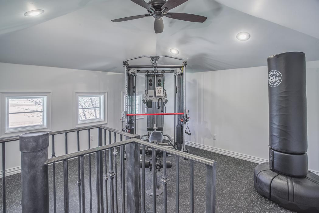 Workout-exercise room in beautiful custom home built by Sharkey Custom Homes in Lubbock, Texas.