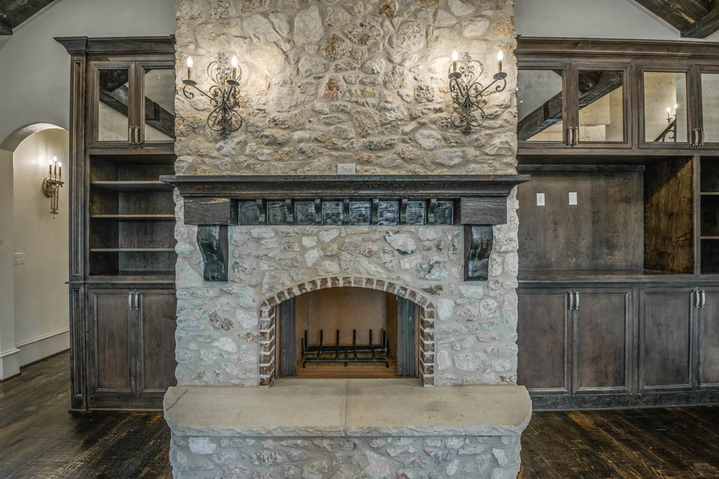 Detail of beautiful fireplace in custom Lubbock home.