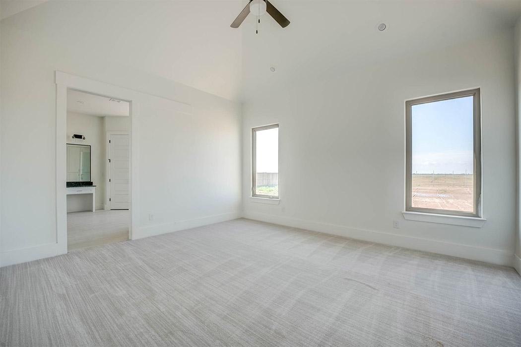 Spacious master bedroom in beautiful new Lubbock home for sale.