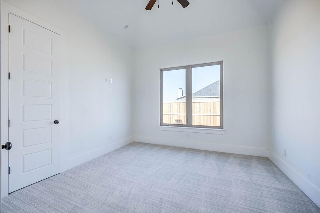 Spacious bedroom in a beautiful new Lubbock home for sale.