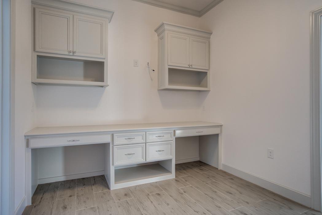 Built-in cabinetry for office or guest bedroom in new Lubbock home.
