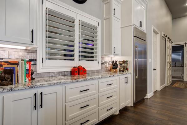 Example of beautiful kitchen in new home built by Sharkey Custom Homes in Lubbock, Texas.